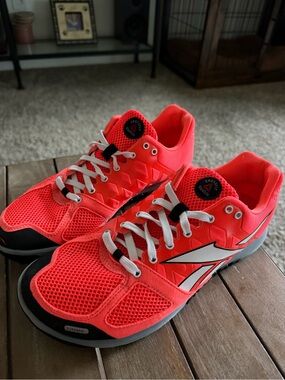 Reebok women’s CrossFit Nano Bright Coral Mesh Sneakers with White Accents